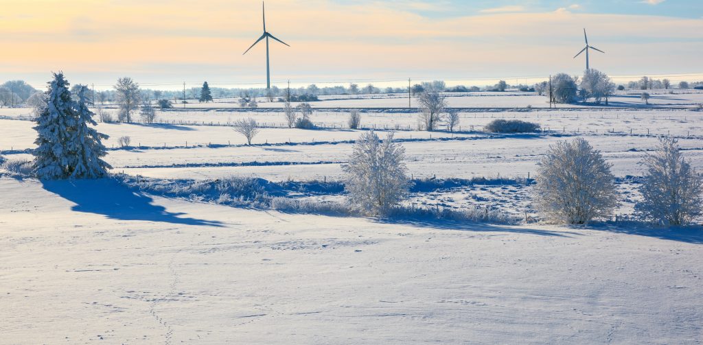 Winter landscape with wind turbines