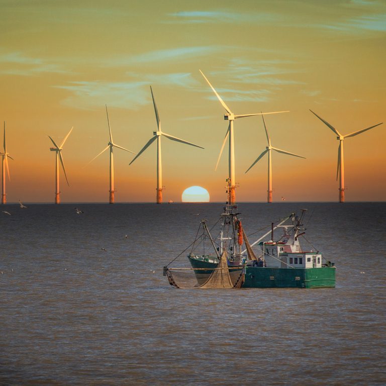 fishing boat and wind turbines