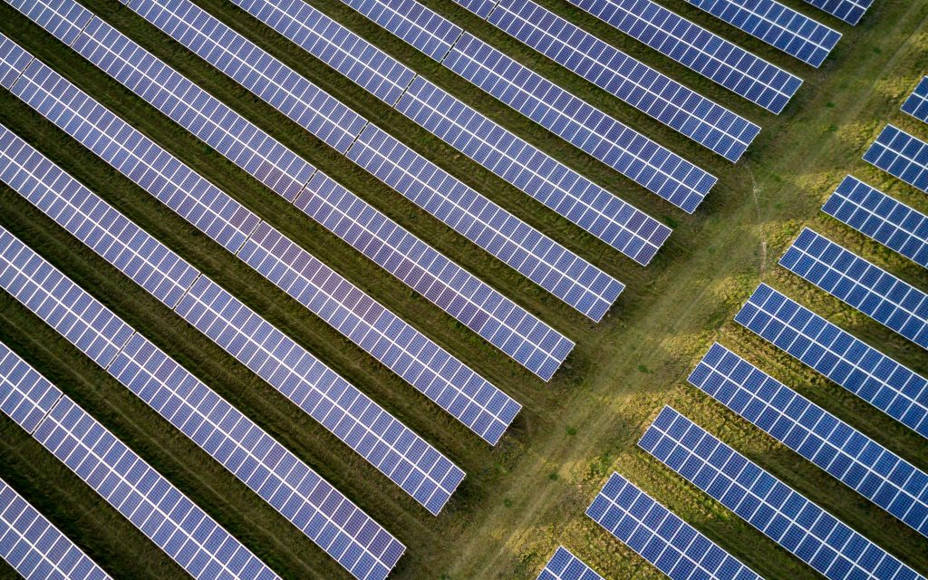 Field of solar panels shot from above