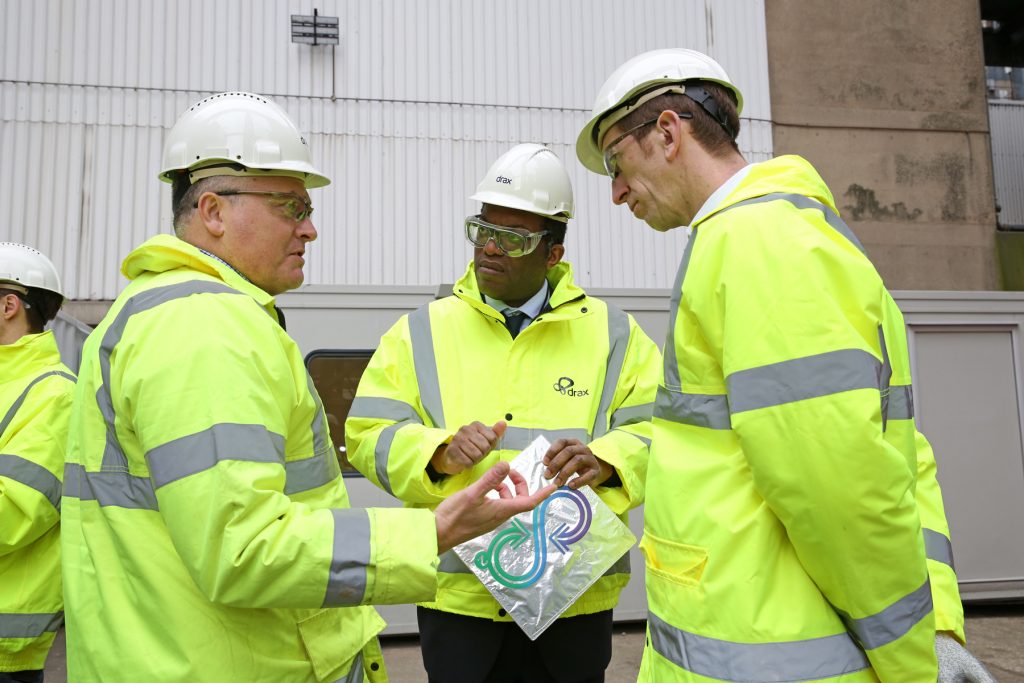 Leigh Taylor from Econic Technologies discussing the polyurethane products made using waste CO2 with Kwasi Kwarteng MP and Jason Shipstone, Drax VP Innovation