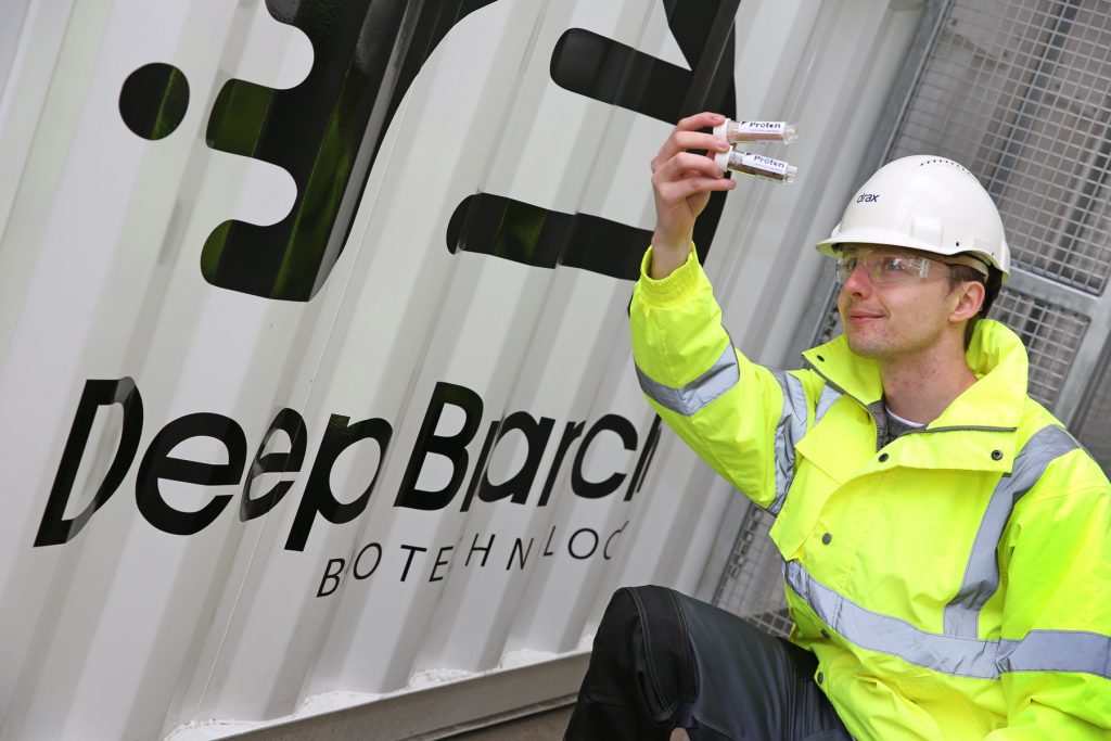 Robert Mansfield from Deep Branch Biotechnology, with samples of the protein it will produce using CO2 from Drax, outside the company’s new pilot plant within Drax’s CCUS incubation area