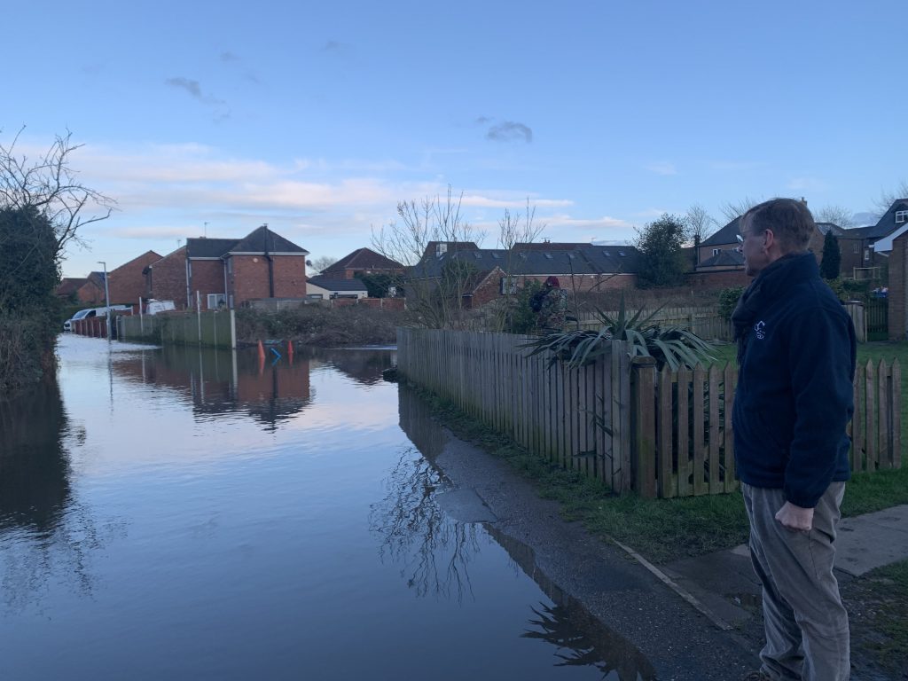 Drax Group CEO Will Gardiner viewing flooding in East Yorkshire town of Snaith