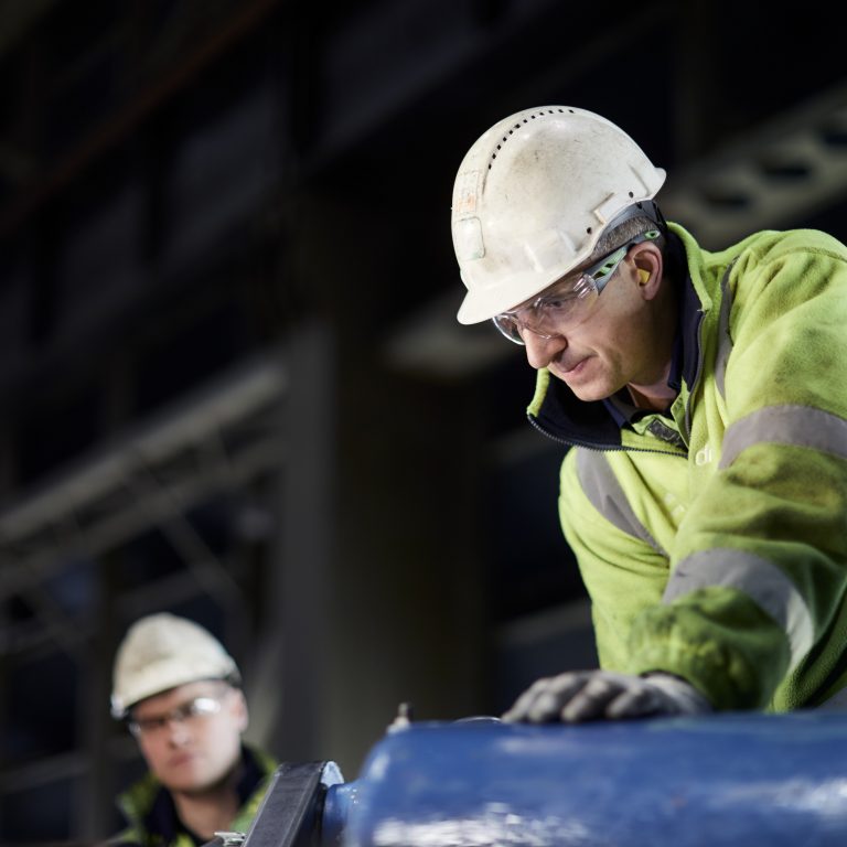 Engineers in PPE working at Drax Power Station