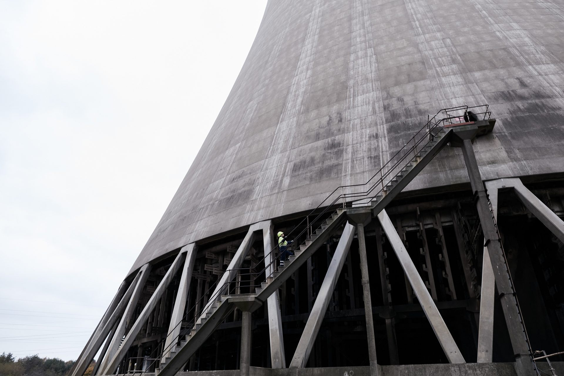 Engineer climbs cooling tower at Drax Power Station