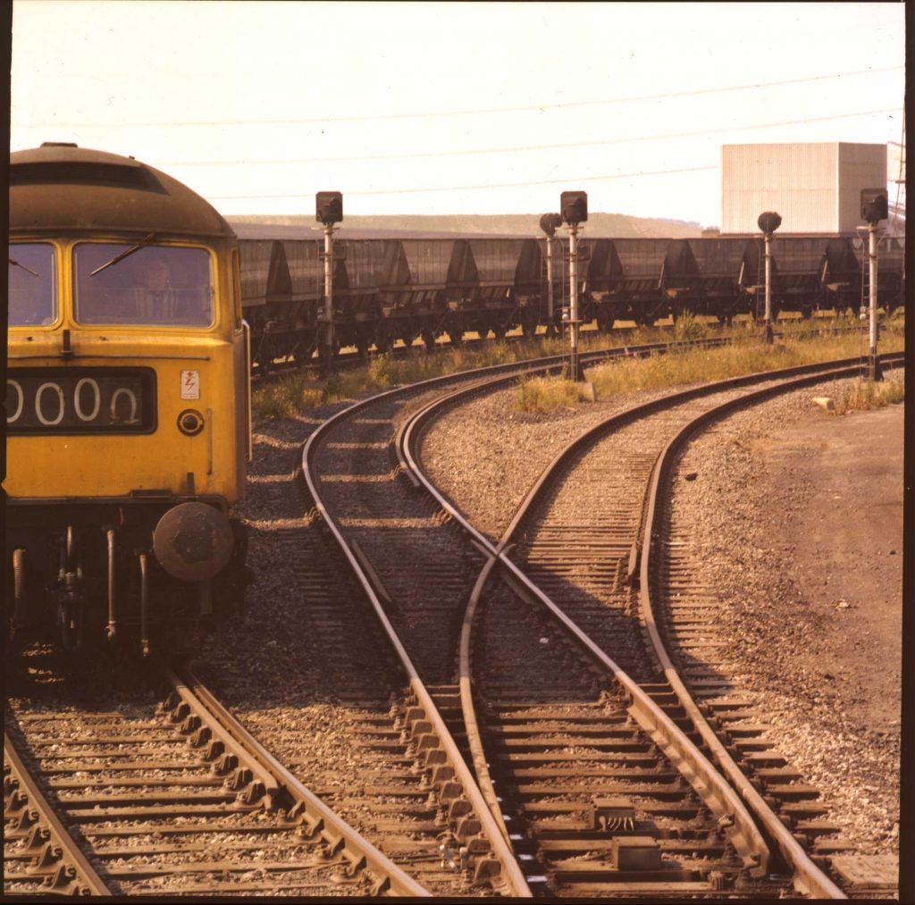 coal locomotive on rail tracks