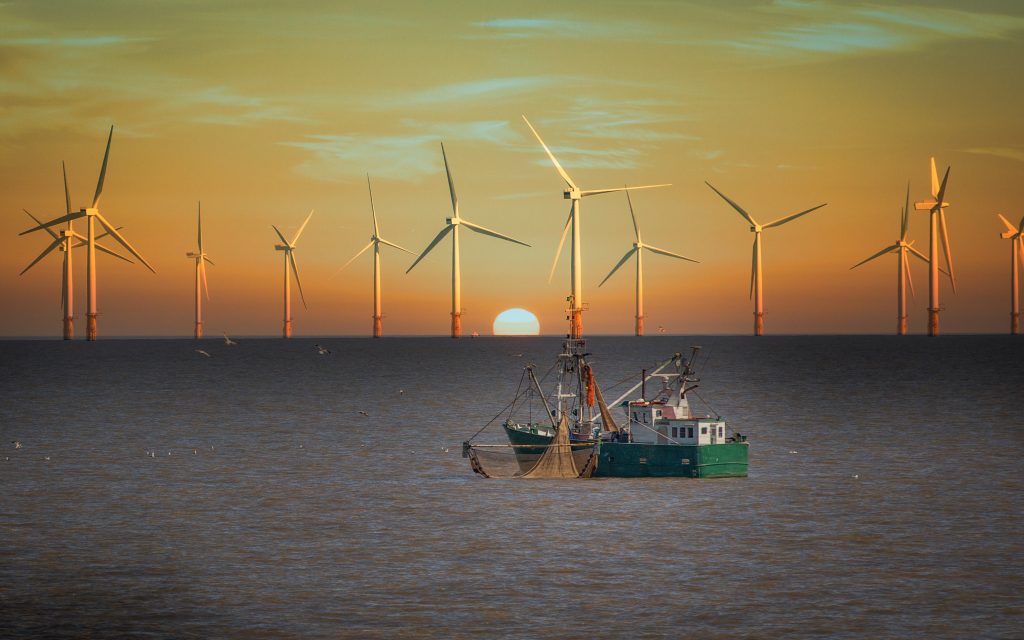 fishing boat and wind turbines