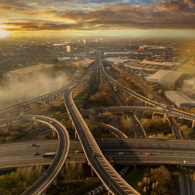 Birmingham UK Spaghetti Junction aerial with city centre background