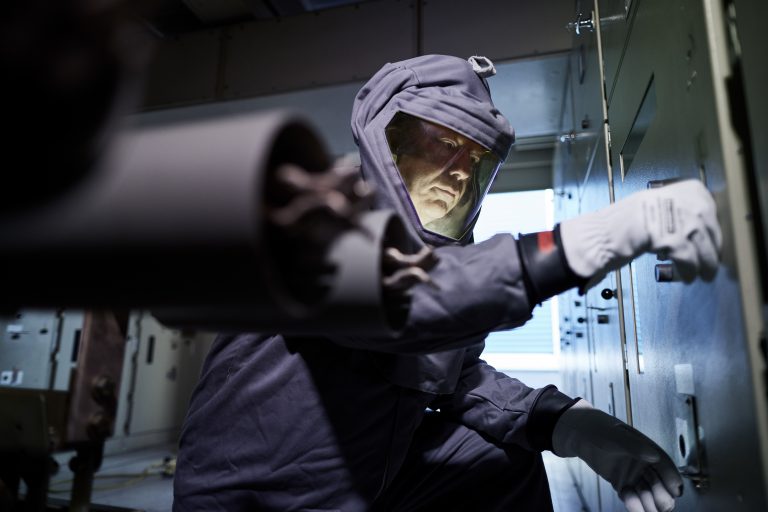 Engineer working in PPE at Rye House Power Station in Hertfordshire