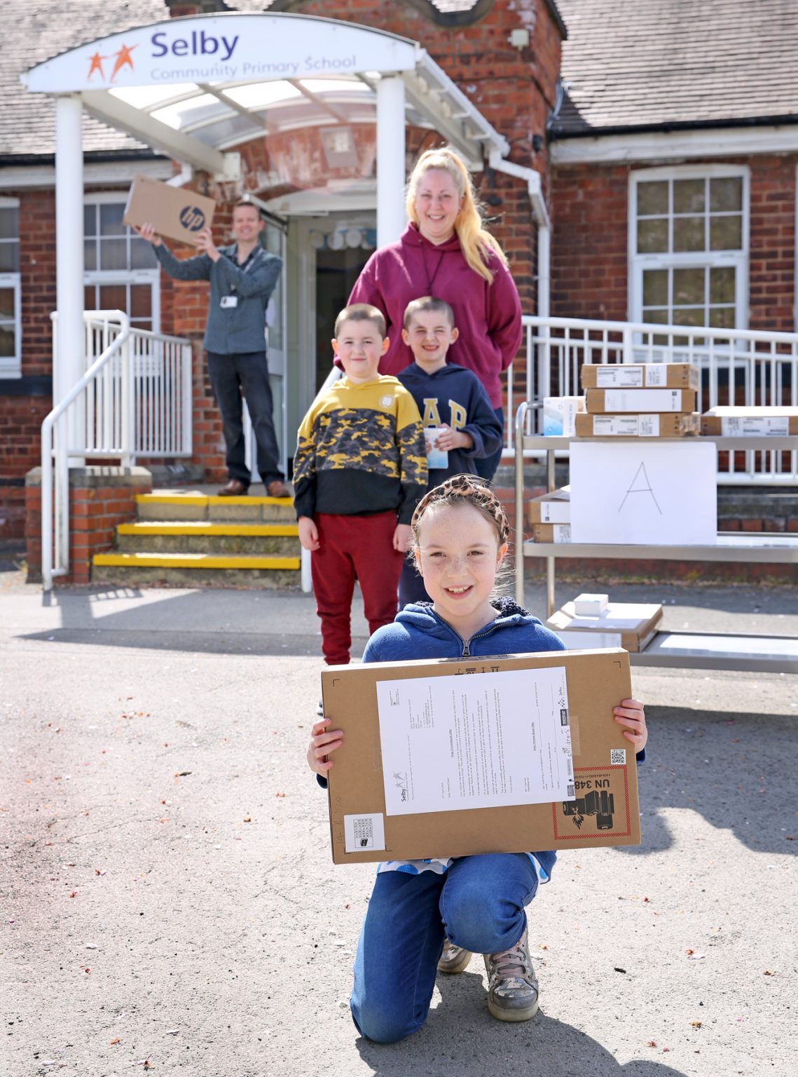 Drax delivers laptops for learners to keep schools and students