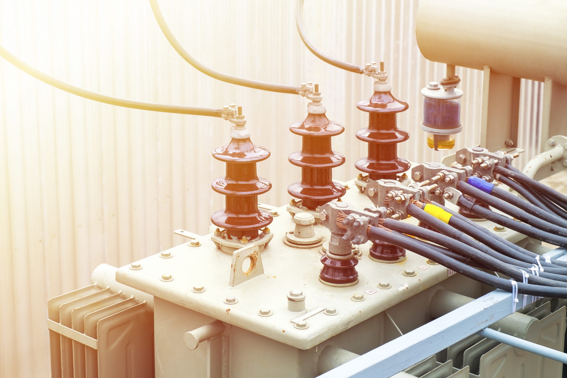 High voltage electric transformer in a power substation above the