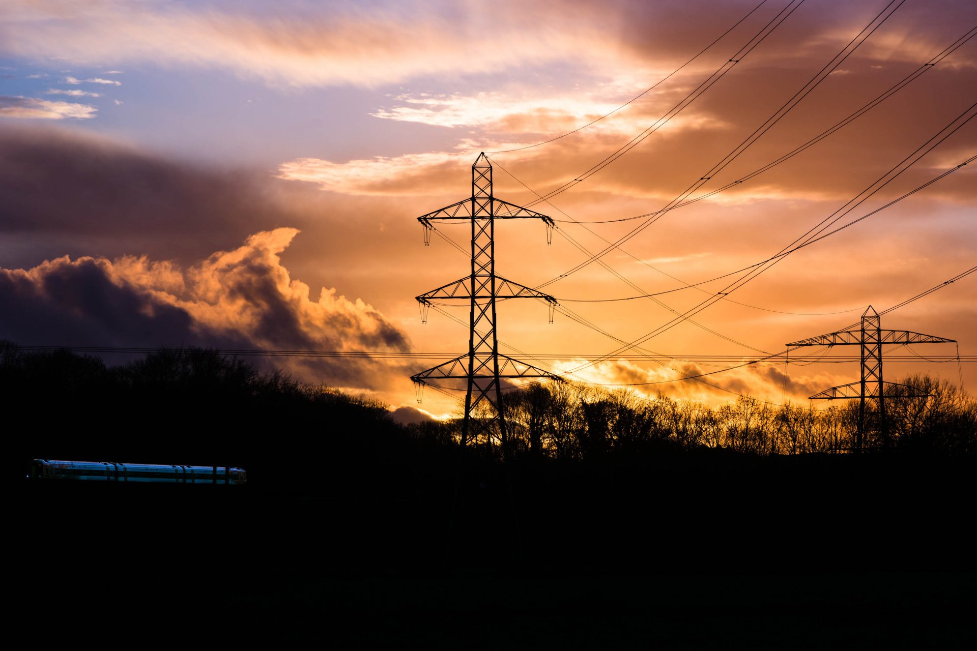 What: Industrial landscape with cables, pylons and train at sunset Where: Somerset, UK When: January 2016