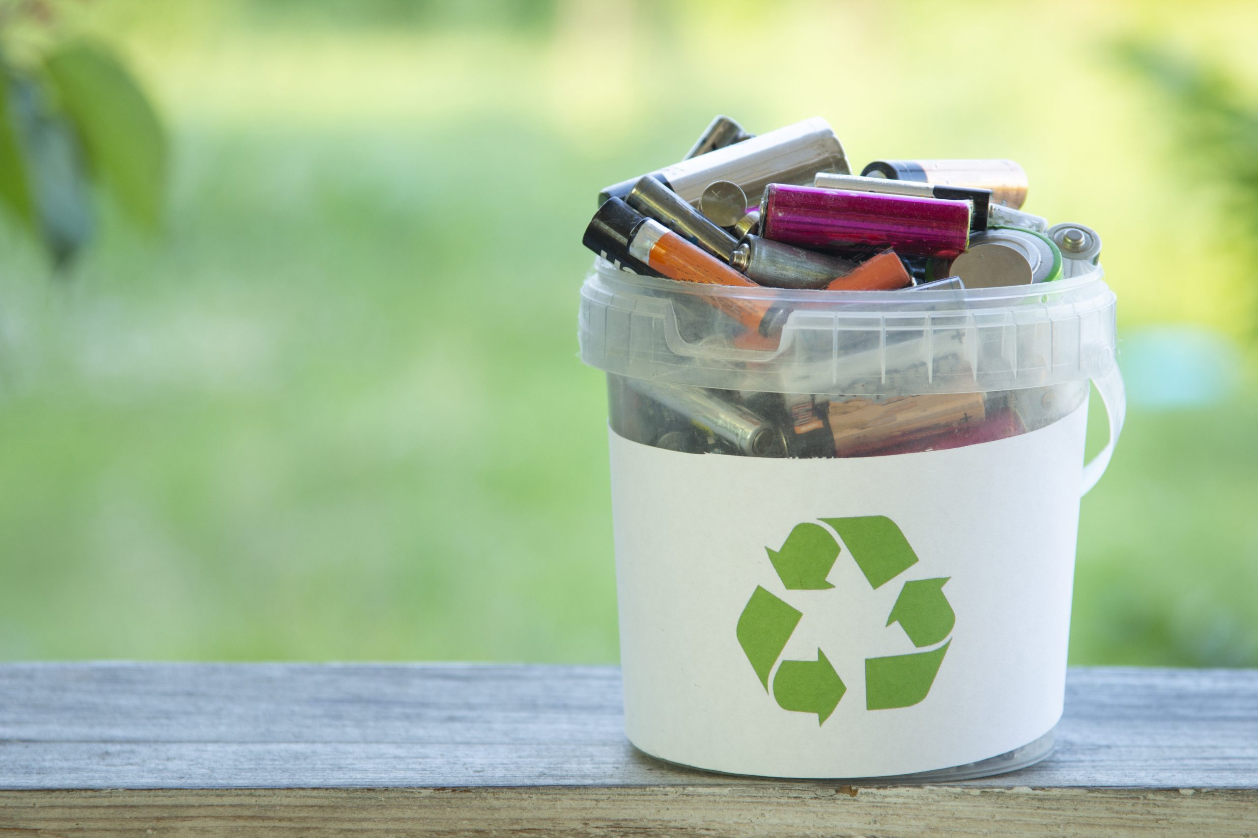 batteries in a recycling bucket