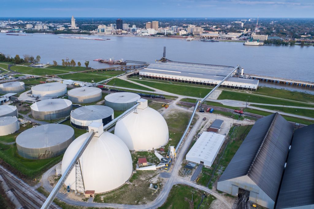 Sustainable biomass wood pellet storage domes at Baton Rouge Transit, a renewable fuel storage and logistics site operated by Drax at the Port of Greater Baton Rouge, Louisiana