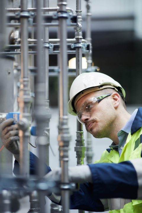 Engineer inspects carbon capture pilot plant at Drax Power Station