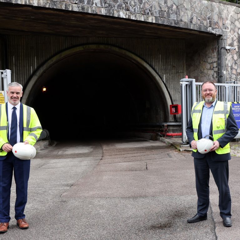 Drax Group’s Ian Kinnaird (L) with UK Government Minister for Scotland, David Duguid (R), at the mouth to the access tunnel to Cruachan Power Station which stretches 1km into the heart of Ben Cruachan.