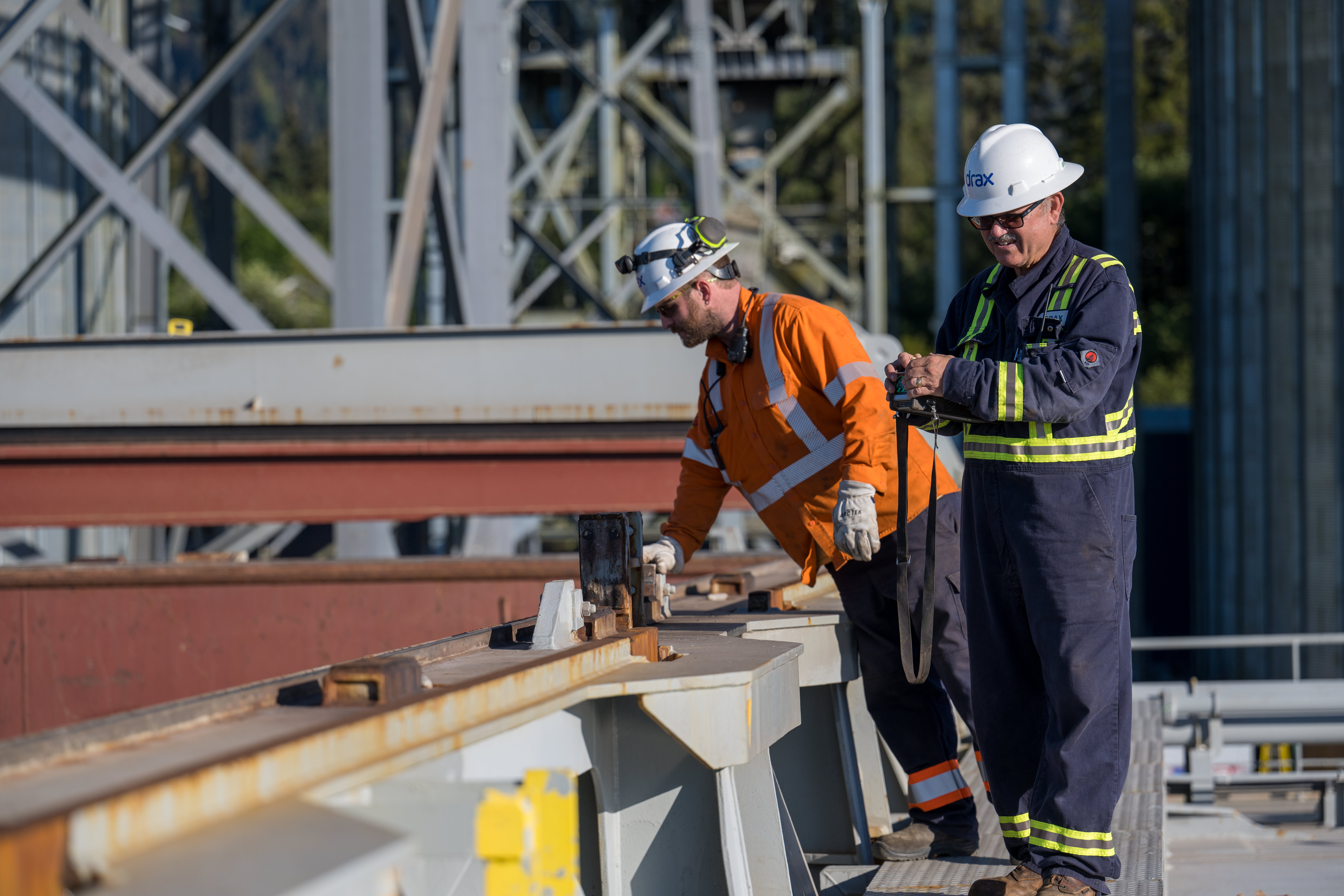 Drax workers in PPE at pellet plant