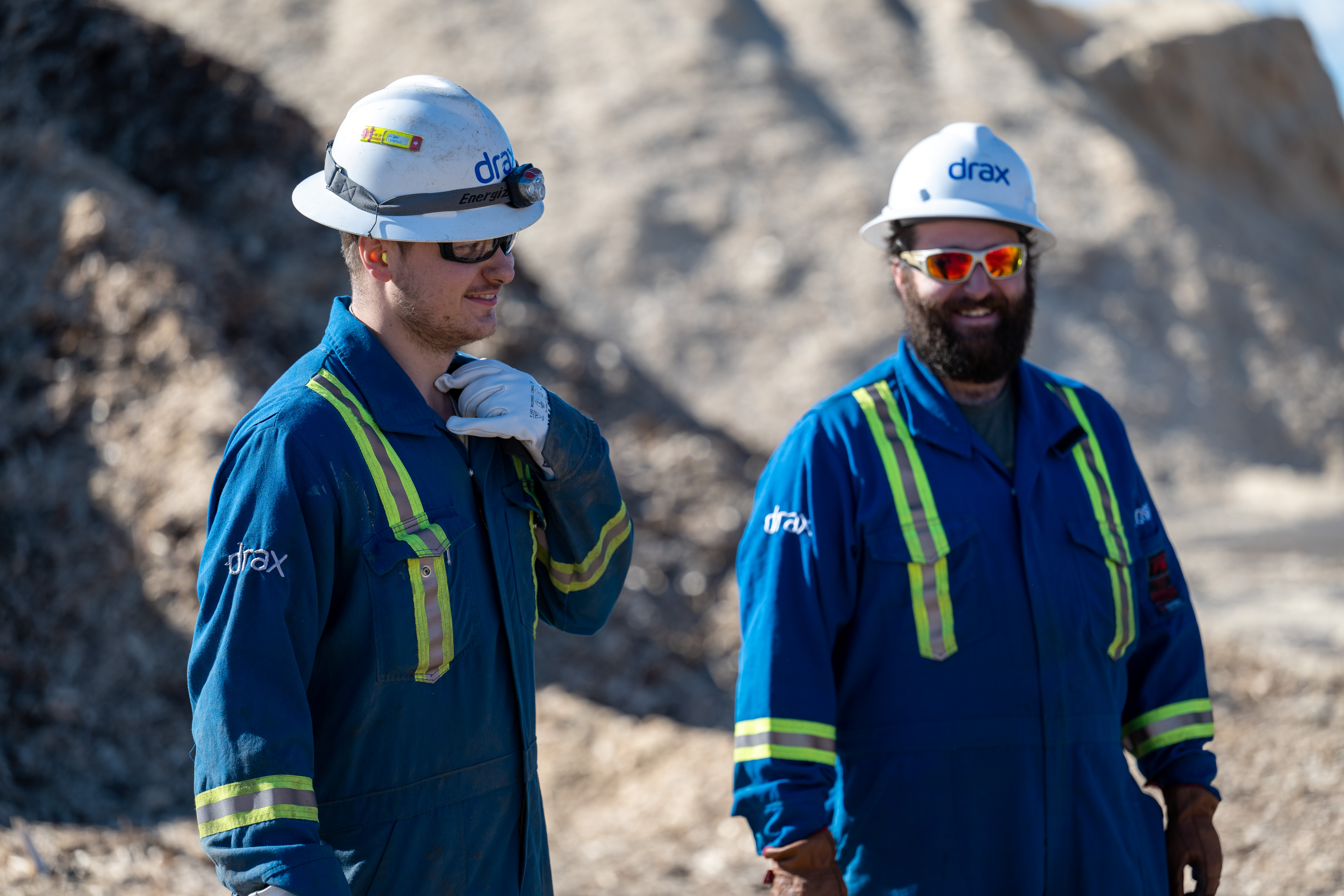 Two Drax workers in PPE at pellet plant