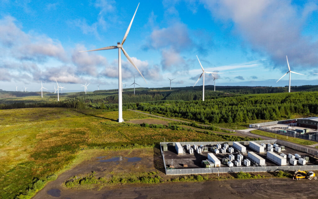 Battery energy storage site and wind turbines